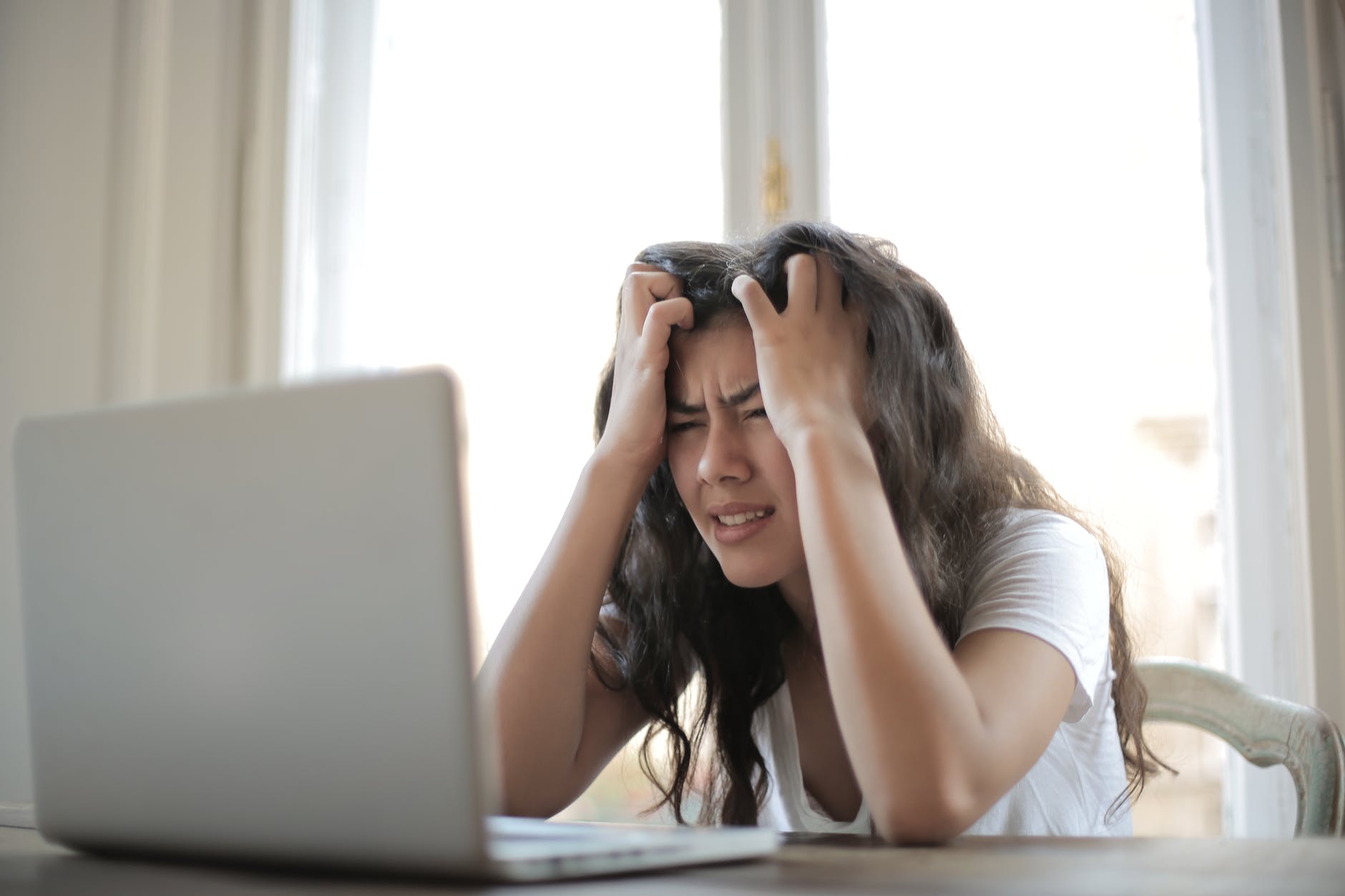 woman in white shirt showing frustrated girl motivate
